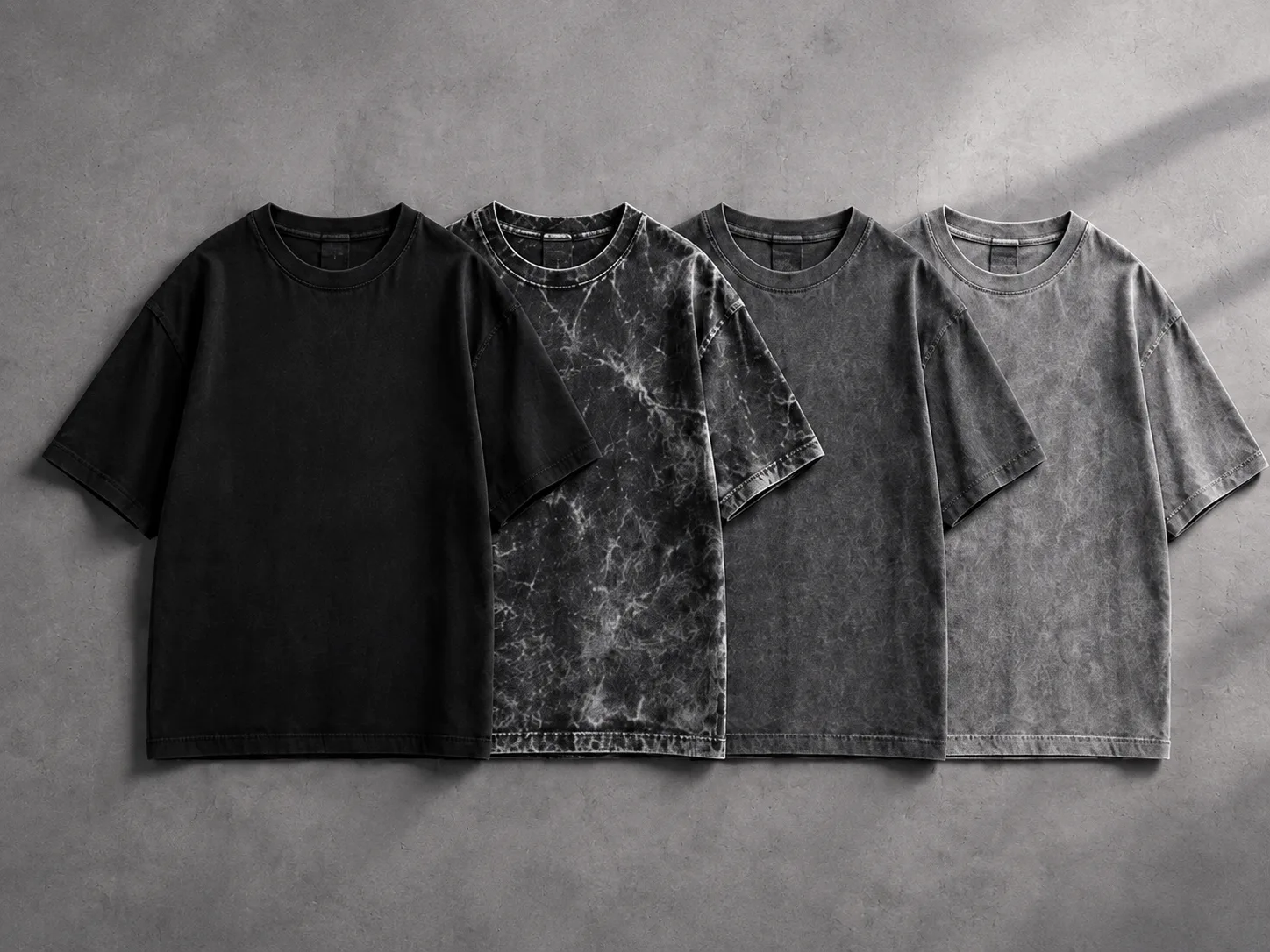 Four T-shirts with different wash effects